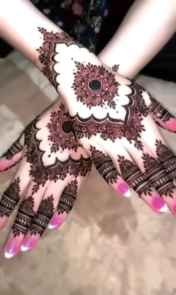 Mehndi with pink nails at Glow Beauty Salon Kasur